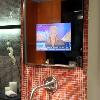 mirror tv bathroom